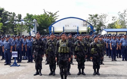 <p><strong>BACK FROM THE POLL ASSIGNMENT.</strong> The 990 police officers during the welcome ceremony at the PNP regional headquarters after securing the village elections in Eastern Visayas on Thursday (May 17, 2018). (P<em>hoto courtesy of PNP Region 8</em>)</p>